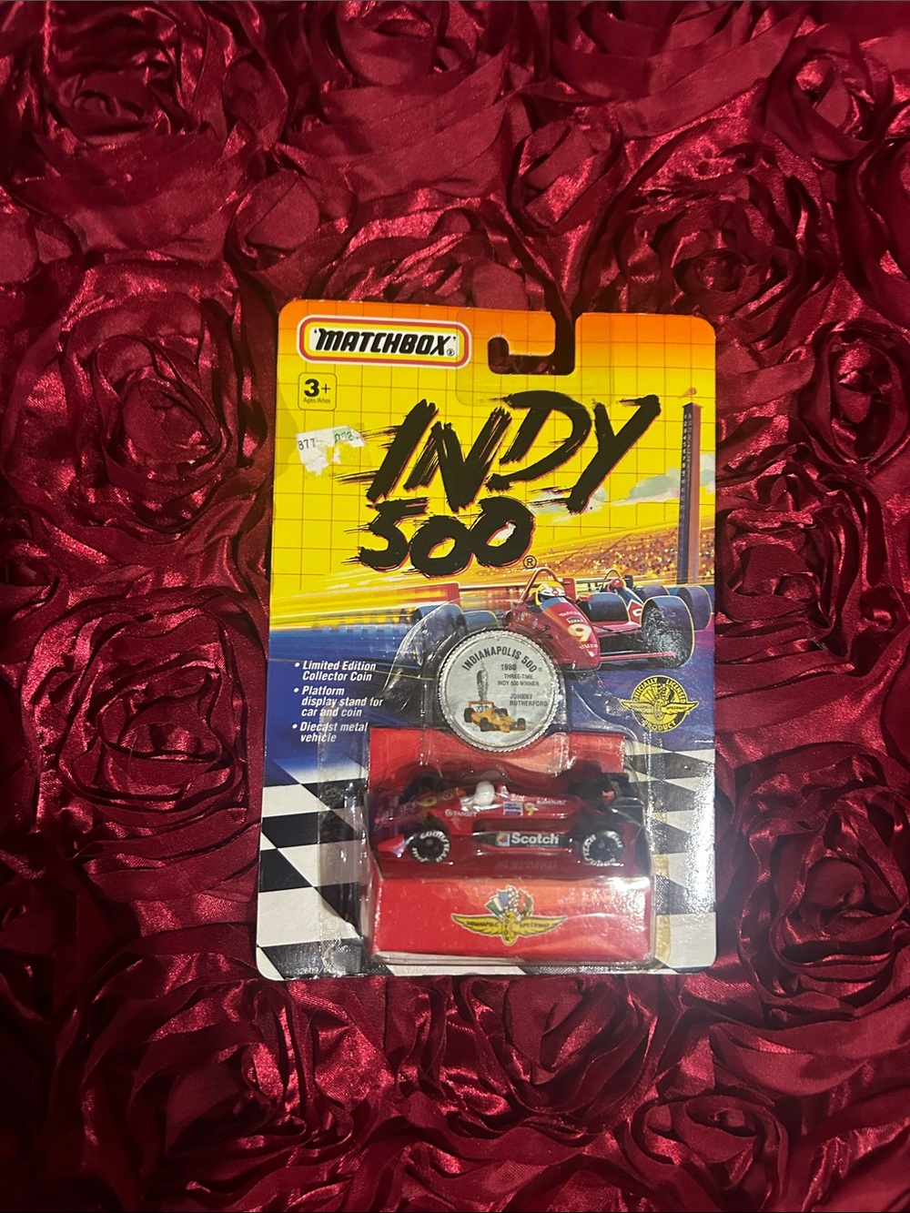Matchbox Johnny Rutherford red Indy 500 Die-Cast Race Car with Collector Coin